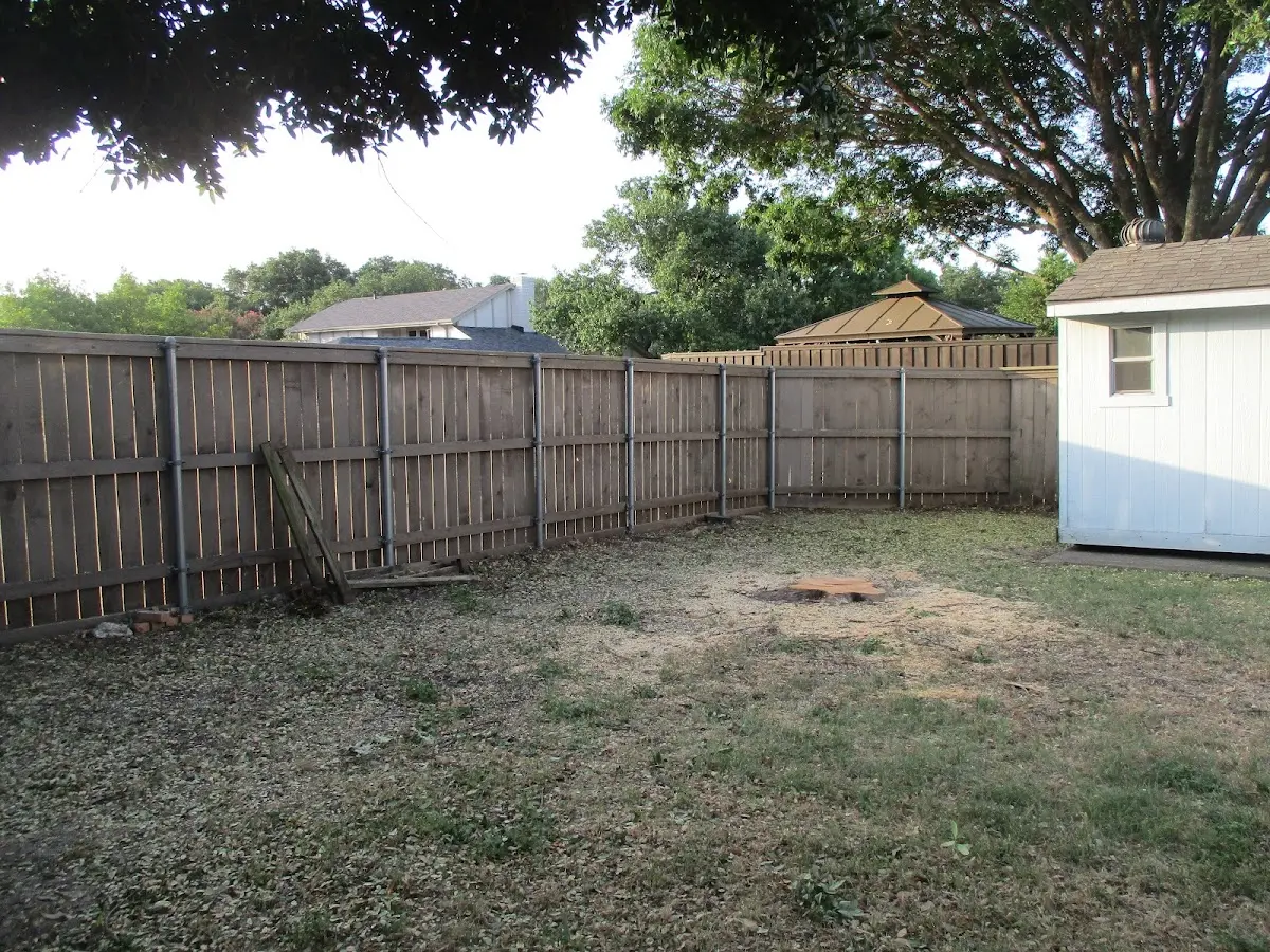 Cleared yard after professional tree removal in Fort Hall